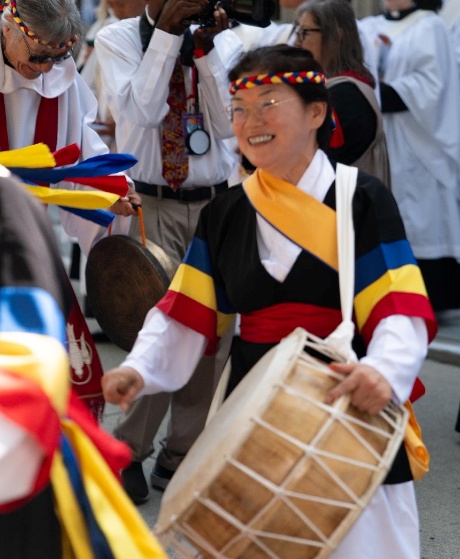 A Korean drummer performs during the consecration procession at All Saints Episcopal Church in Pasadena.